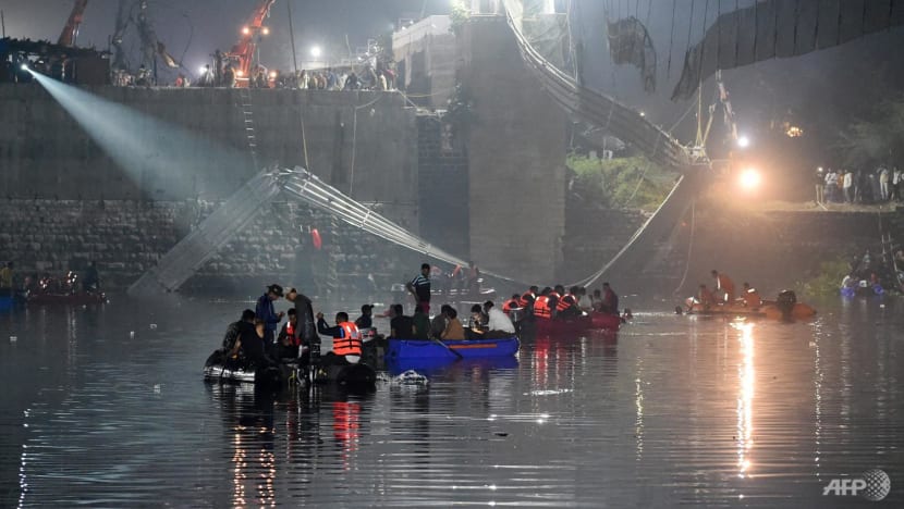 India bridge collapses, killing at least 120 people India bridge collapses, killing at least 120 people