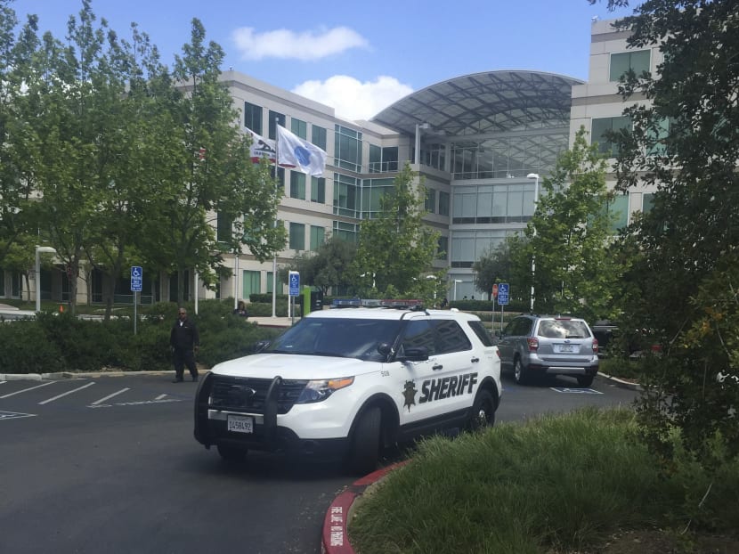A Santa Clara county Sheriff's Office vehicle is shown parked outside one of the main office buildings of the Apple campus in Cupertino, California, April 27, 2016.  Photo: Reuters