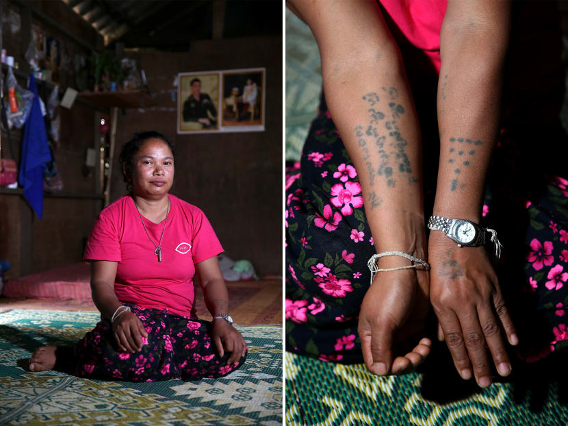 (Left) Gong Namsaengkondoi, 38, from the Lua tribe in Myanmar. She walked and hitchhiked  from  Myanmar for several days before settling in Mae Sai, Chiang Rai, Thailand. (Right) Gong’s tribal tattoos