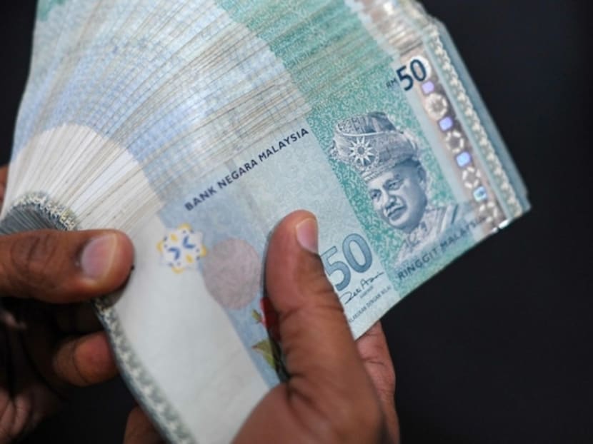 The ringgit declined 0.4 per cent to 3.7650 a dollar as of 10.26am in Kuala Lumpur, data compiled by Bloomberg show. Photo: Malay Mail Online