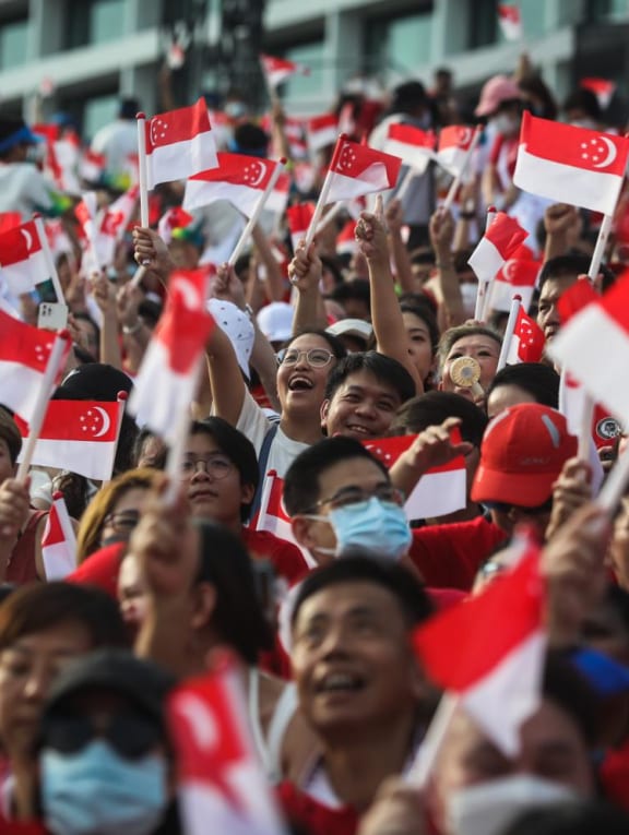 S'pore celebrates 57th birthday in full force, with first large scale NDP since pandemic capturing the highs and lows