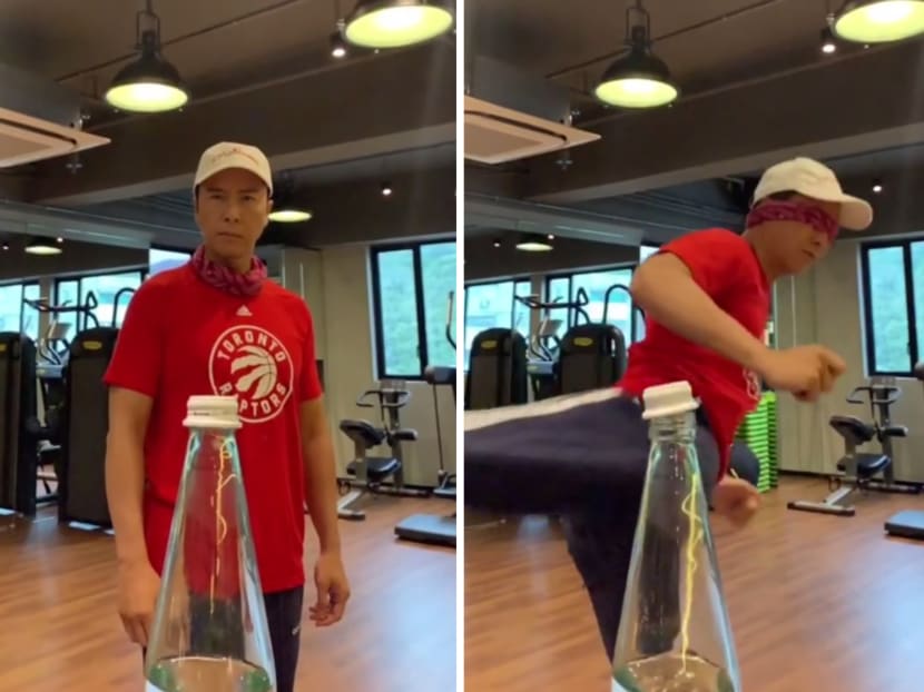 A blindfolded Donnie Yen takes on the bottle cap challenge.