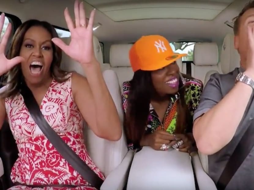 Screengrab from YouTube showing Michelle Obama with Missy Elliott and James Corden in Carpool Karaoke.