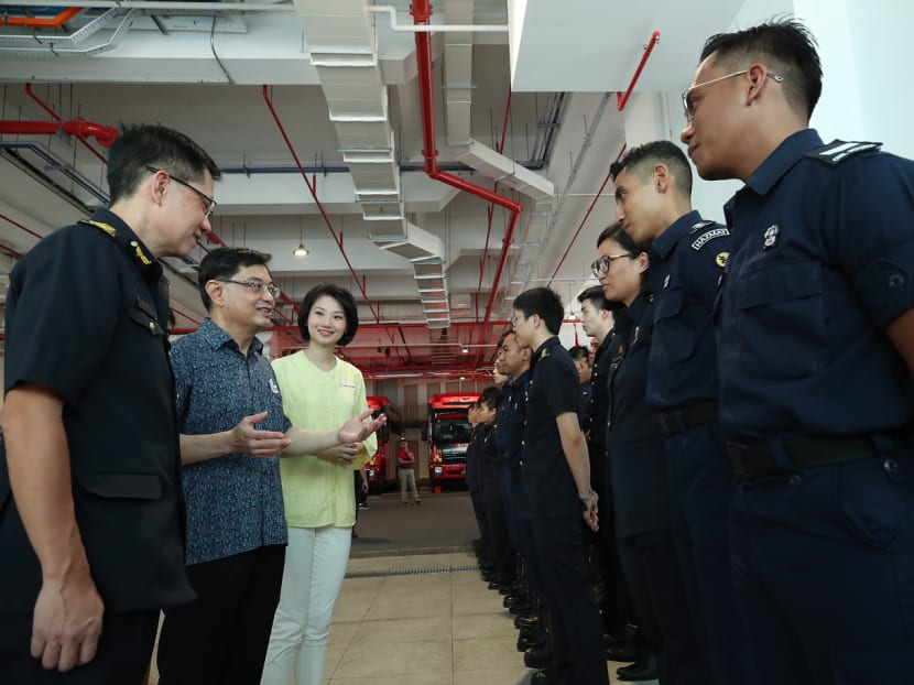 Deputy Prime Minister Heng Swee Keat said he will unveil several measures to support companies and help workers stay in their jobs in his Budget statement on Tuesday. He is seen here with Senior Parliamentary Secretary for Home Affairs Sun Xueling, interacting with frontline officers from the Singapore Civil Defence Force during a visit to the Kallang Fire Station on Sunday. Deputy Prime Minister Heng Swee Keat said he will unveil several measures to support companies and help workers stay in their jobs in his Budget statement on Tuesday. He is seen here with Senior Parliamentary Secretary for Home Affairs Sun Xueling, interacting with frontline officers from the Singapore Civil Defence Force during a visit to the Kallang Fire Station on Sunday.
