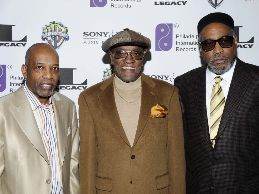 FILE- In this Feb. 6, 2008, file photo, Leon A. Huff, cofounder and vice chairman of Philadelphia International Records, left, singer Billy Paul, center,  and Kenneth Gamble, arrive at "A Special Evening of Conversation Insight and Music" in Los Angeles. AP file photo