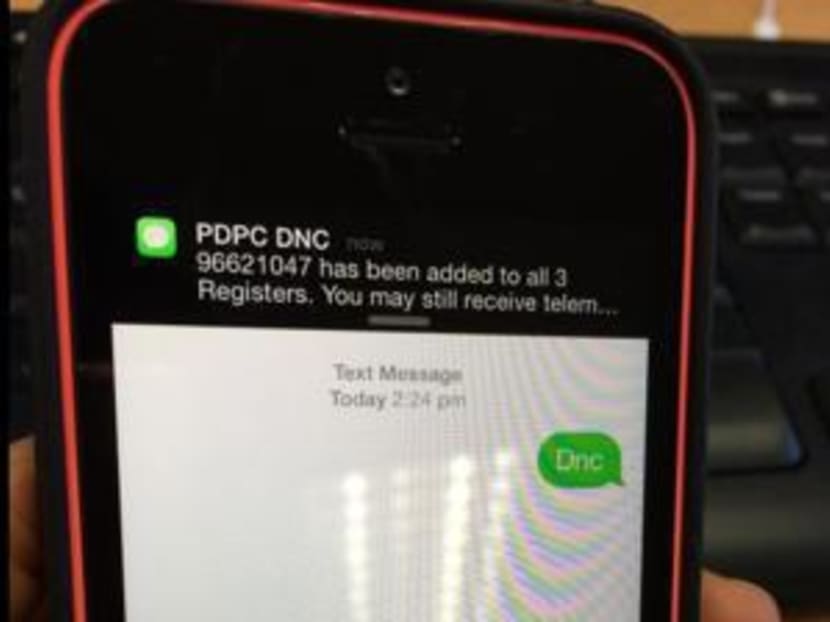 A phone showing the confirmation of the number registered on the Do Not Call Registry. Photo: Channel NewsAsia