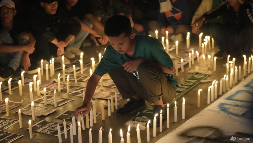 'Time to reflect’: Indonesia's football fans set aside rivalry in wake of deadly stadium stampede