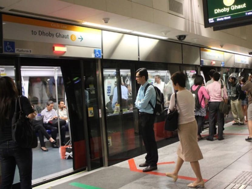 People boarding the MRT on the Circle Line. Photo: Channel NewsAsia
