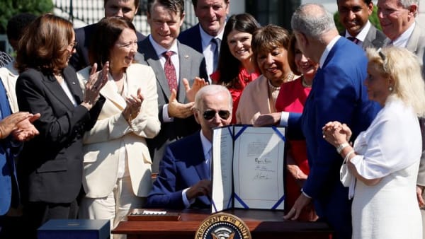 Biden signs bill to boost US chips, compete with China