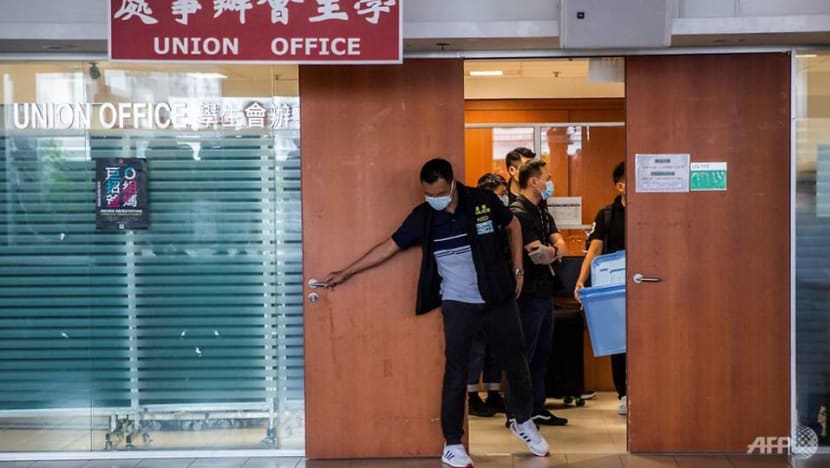 Hong Kong police raid top university in security law probe Hong Kong police raid top university in security law probe