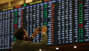 Pakistan benchmark stock index hits record high of 74,000 points