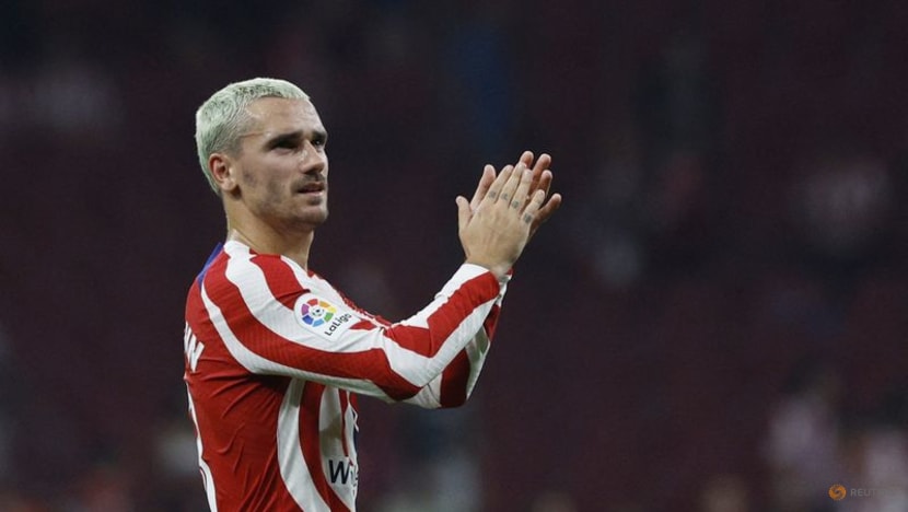 Atletico re-sign Griezmann permanently from Barcelona Atletico re-sign Griezmann permanently from Barcelona