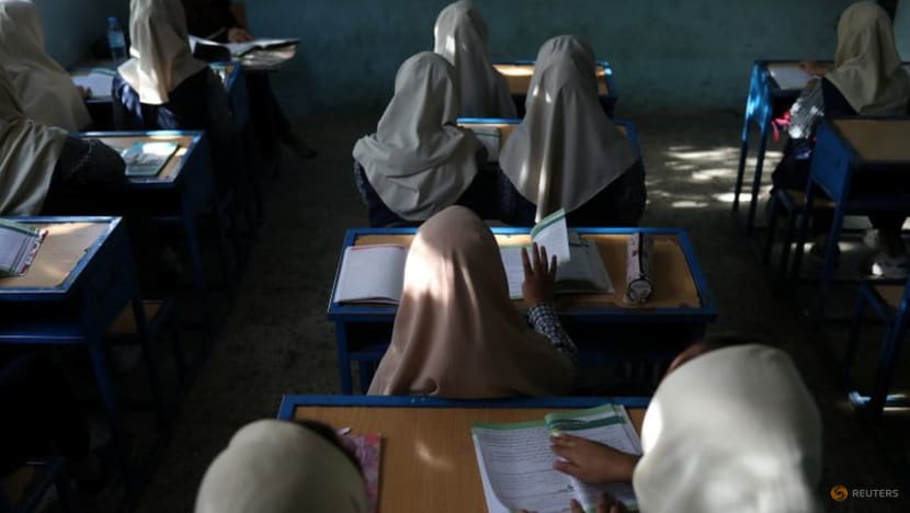 Some Afghan girls return to school, others face anxious wait Some Afghan girls return to school, others face anxious wait