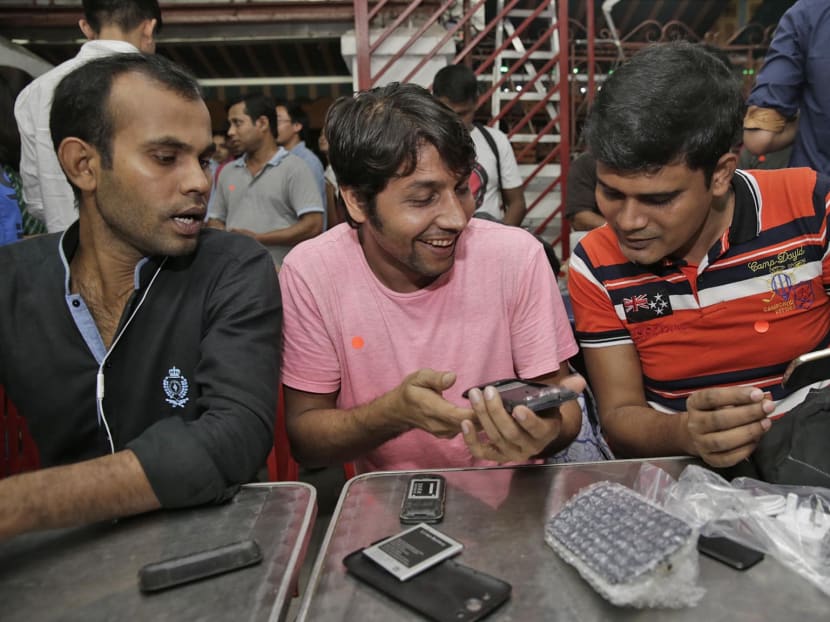 450 needy foreign workers set to get new phones ahead of 3G shift