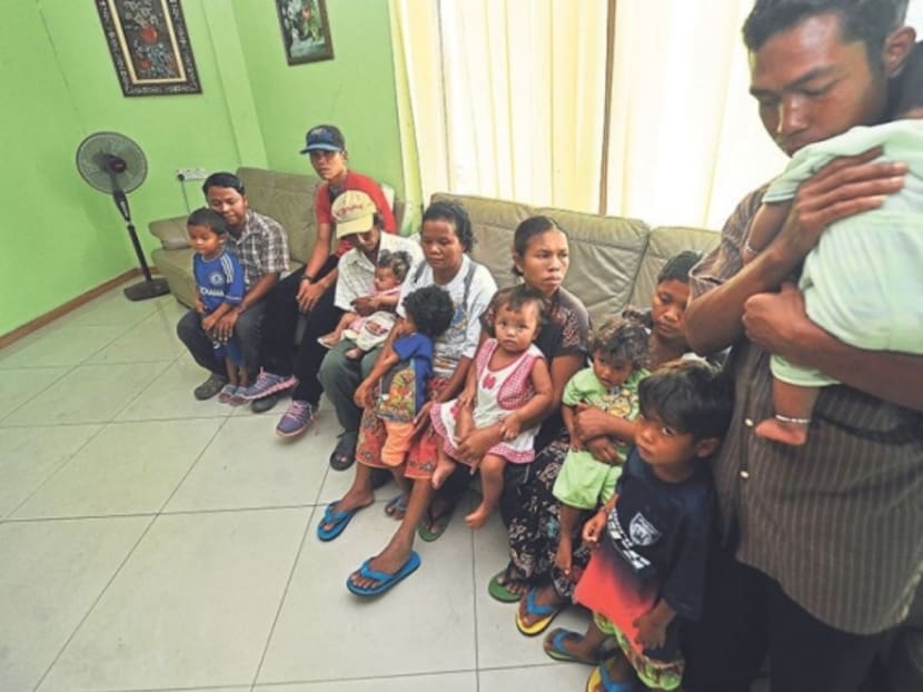 Families of four of the children wait for news at the Goa Hotel in Gua Musang. Photo: Azinuddin Ghazali via Malay Mail Online
