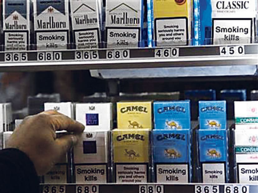 As cigarette smoking is so entrenched in our society, a complete ban may give rise to a black market. Photo: REUTERS