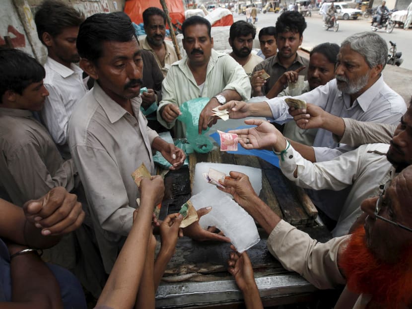 Gallery: Pakistan morgues run out of space as heat wave kills more than 1,000