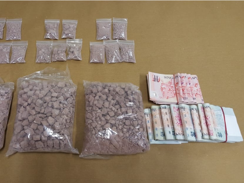 The heroin and cash recovered in an operation on May 27, 2015. Photo: Central Narcotics Bureau