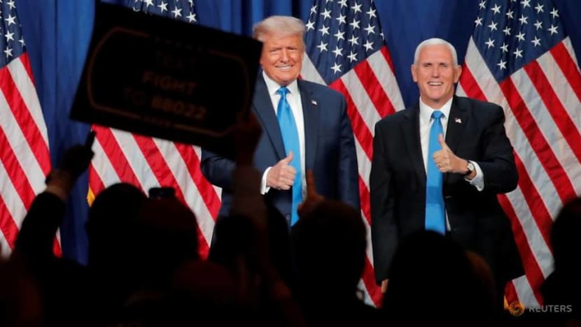 A handshake and a dearth of masks at Pence's Republican convention speech A handshake and a dearth of masks at Pence's Republican convention speech