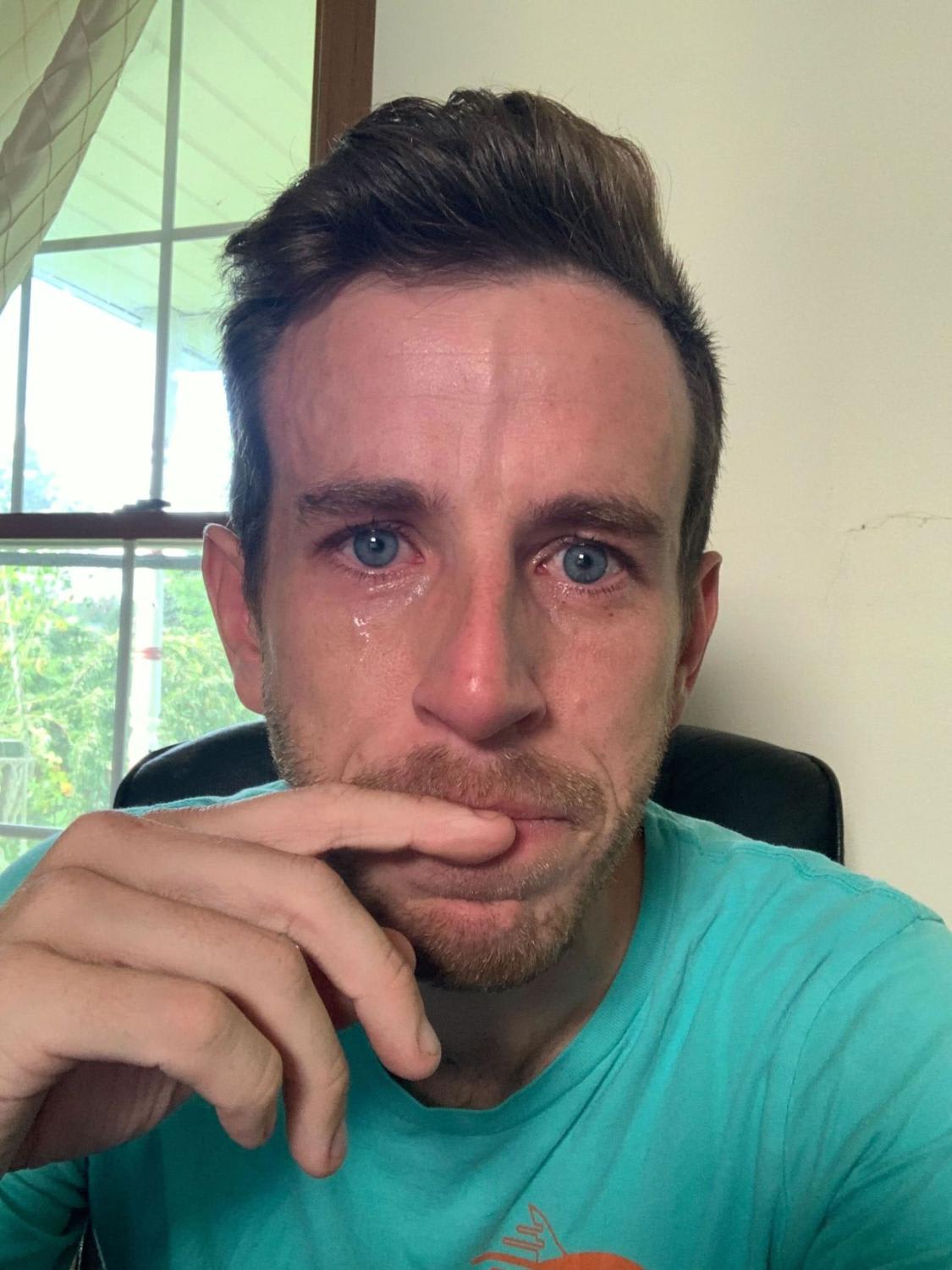 Mr Braden Wallake's photo of himself crying. Many LinkedIn users have called his post "cringeworthy", “self-indulgent” and “tone-deaf”.