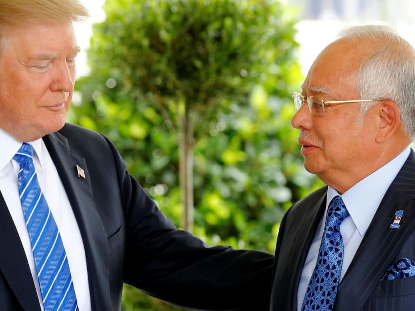 US President Donald Trump welcomes Malaysia's Prime Minister Najib Razak to the White House in Washington, US. Photo: Reuters