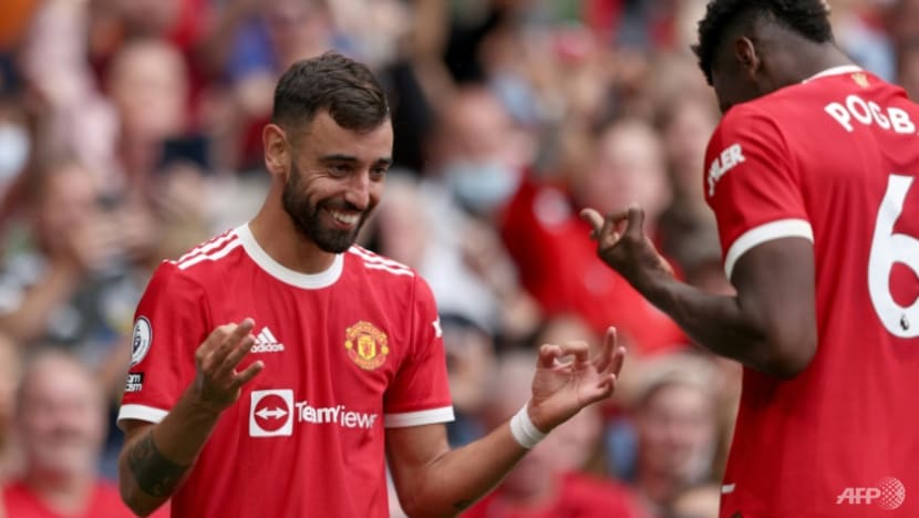 Football: Fernandes fires hat-trick as Man United thrash Leeds in season opener Football: Fernandes fires hat-trick as Man United thrash Leeds in season opener