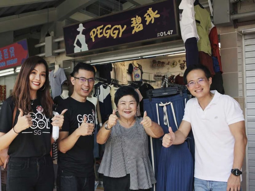 From left: Ms Charissa Goh; Mr Nigel Teo; a clothing stall operator in Tampines; and Mr Desmond Choo, Member of Parliament for Tampines Group Representation Constituency.