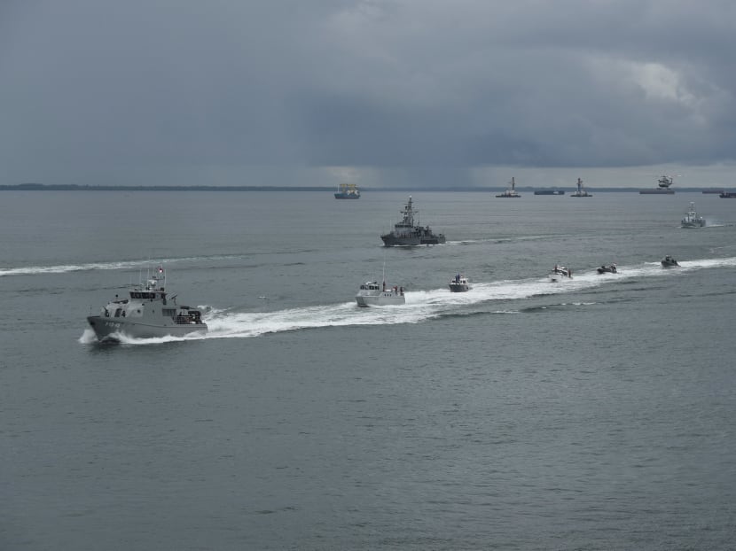 Indonesia navy ships take part in a parade during the launch of coordinated patrols to beef up security between Malaysia, Indonesia, and Philippine off the Tarakan sea, in Tarakan, Indonesia. Photo: Reuters