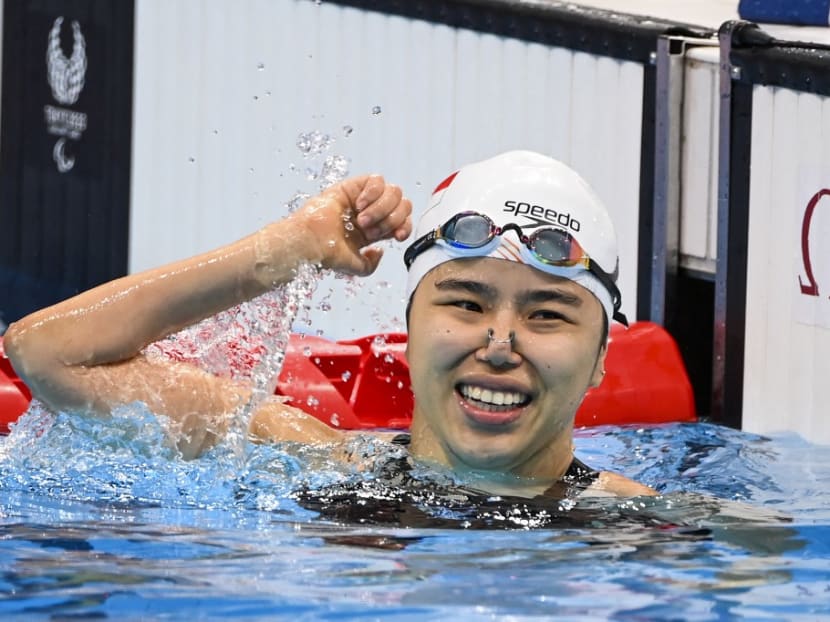 Singapore's Yip Pin Xiu celebrates after winning gold in the women's 50m backstroke S2 swimming event during the Tokyo 2020 Paralympic Games at the Aquatics Centre in Tokyo on Sept 2, 2021.