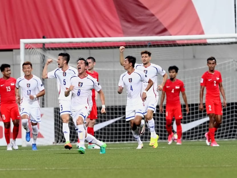 Taiwan's Xavier Chen (No. 8) and teammates celebrating after scoring against Singapore. Photo: Nuria Ling / TODAY
