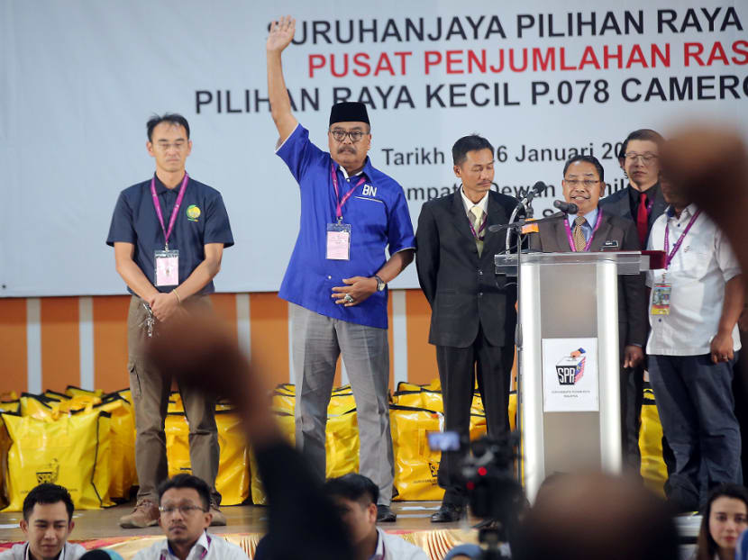 Barisan Nasional (BN) retained the Cameron Highlands parliamentary seat with Ramli Mohd Nor (centre) winning the by-election with a 3,238-vote majority.