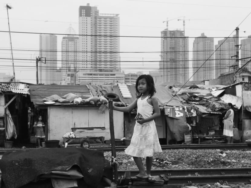 About 28 million Indonesians live below the poverty line, and private and non-profit sectors can invest more attention and resources in education to break the poverty cycle. Photo: Reuters