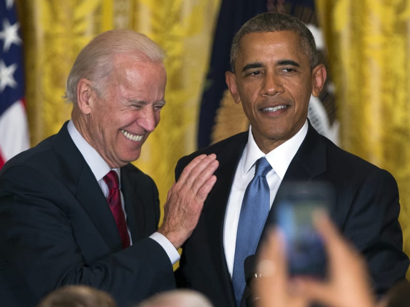 Vice President Joe Biden, left, and President Barack Obama at the White House during a reception to celebrate LGBT Pride Month, on June 24, 2015, in Washington. Photo: AP