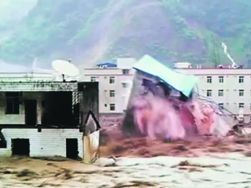 Huge landslide in western China buries dozens