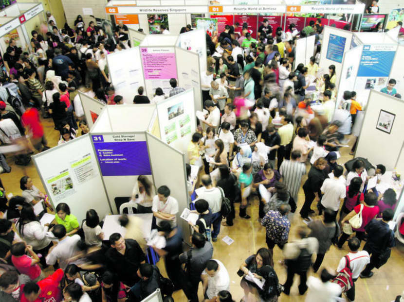 Job seekers attend a service industry job fair organised by North West Community Development Council. TODAY file photo