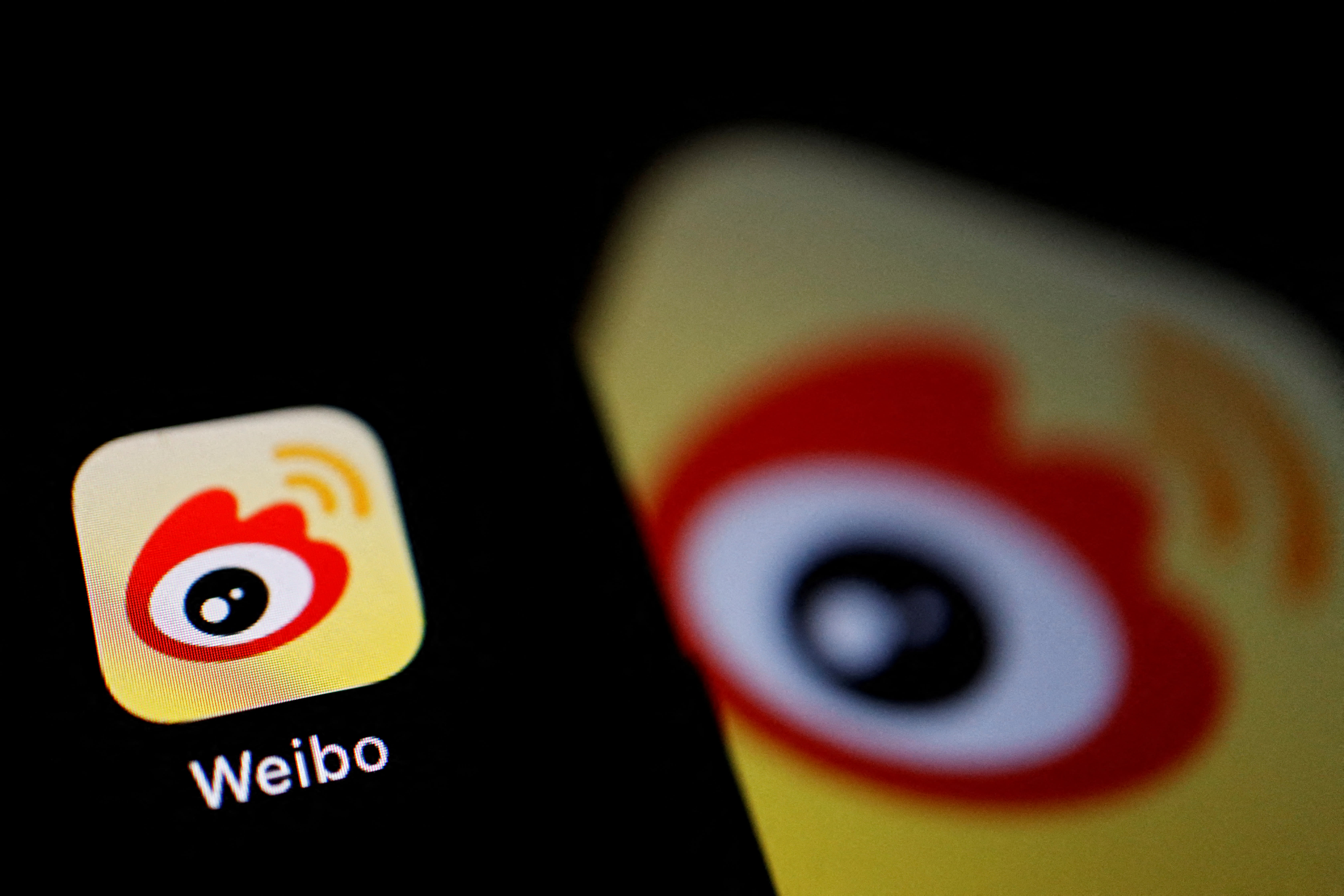 The logo of Chinese social media app Weibo is seen on a mobile phone in this illustration picture taken on Dec 7, 2021. 
