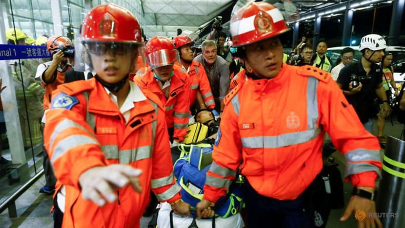 Ambulance crew injured by Hong Kong airport protesters while helping patient: Fire department Ambulance crew injured by Hong Kong airport protesters while helping patient: Fire department
