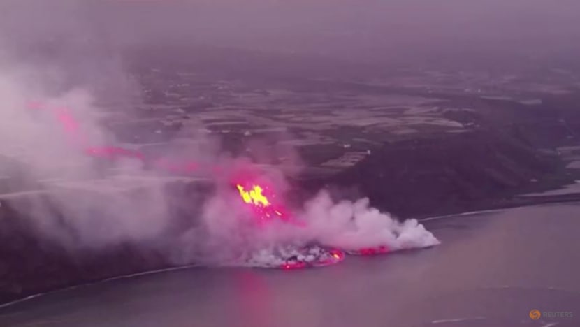 Spain's La Palma gains ground from the sea as lava piles up Spain's La Palma gains ground from the sea as lava piles up