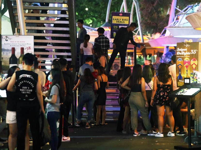 The queue outside Get Juiced, a club at Clarke Quay, on Wednesday, March 25, 2020. The queue outside Get Juiced, a club at Clarke Quay, on Wednesday, March 25, 2020.