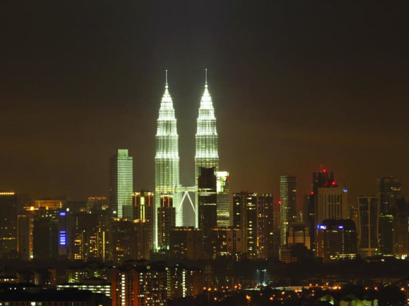 Economists play down concerns over Malaysia's fiscal health despite government’s populist measures Economists play down concerns over Malaysia's fiscal health despite government’s populist measures