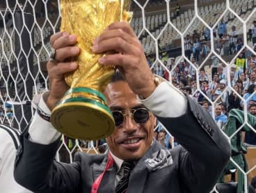 Screengrab from Salt Bae's Instagram showing him hold the World Cup trophy.