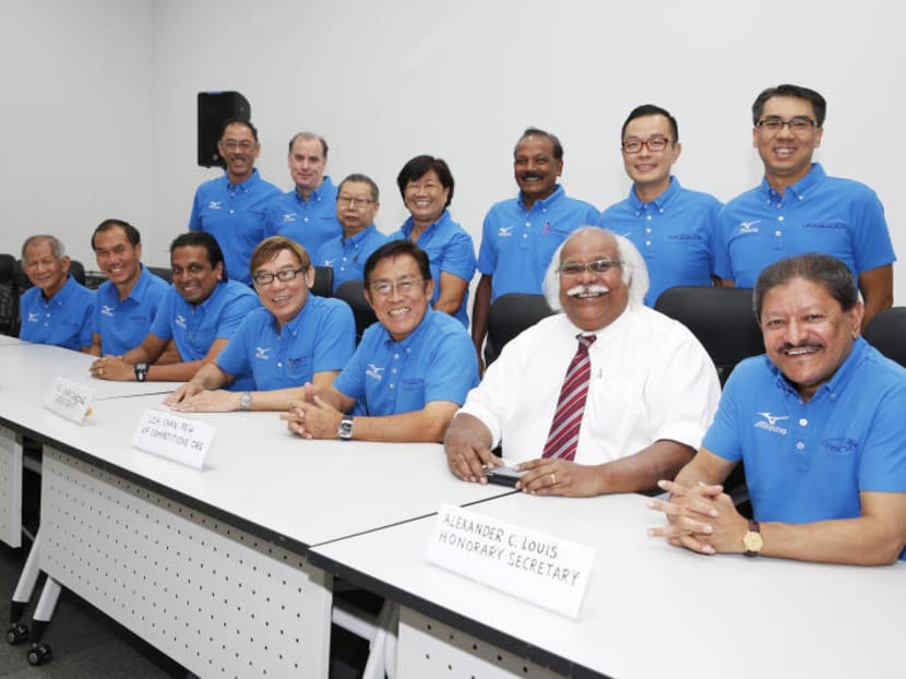 Singapore Athletics president Ho Mun Cheong (front row, fourth from left) at the press conference last June to announce his team for the elections. TODAY FILE PICTURE