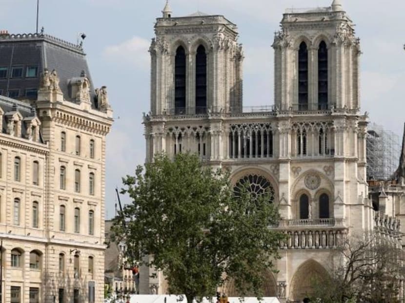With choir in hard hats, fire-ravaged Notre-Dame rings in Christmas With choir in hard hats, fire-ravaged Notre-Dame rings in Christmas