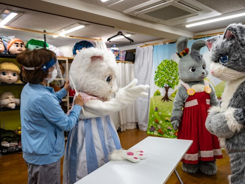 This picture taken on June 5, 2021 shows Ms Choko Ohira teaching during a mascot acting class at Choko.Group in Tama city of Tokyo.