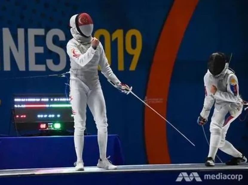 Singapore's Amita Berthier celebrates scoring a point in the SEA Games women's fencing semi-finals on Tuesday, Dec 3, 2019.