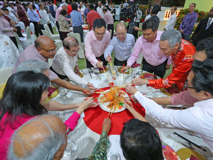 Prime Minister Lee Hsien Loong celebrates an early Chap Goh Mei dinner with Members of Parliament, community leaders, and guests at the Istana on Feb 26, 2018. Photo: MCI