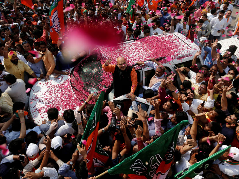 Photo of the day: India's Bharatiya Janata Party President Amit Shah arrives at the party's headquarters after learning the initial election results that has the party on course for a historic majority, in New Delhi, India, May 23, 2019.