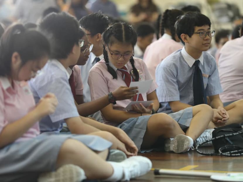Practice of withholding PSLE results slips due to unpaid school fees should be reviewed: Ong Ye Kung Practice of withholding PSLE results slips due to unpaid school fees should be reviewed: Ong Ye Kung