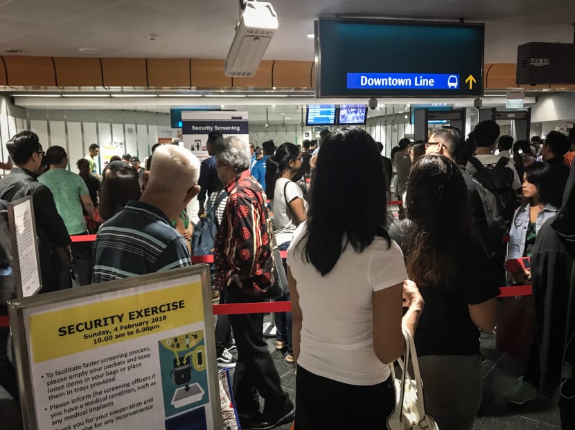 The eight-hour drill, dubbed “Exercise Station Guard 2018”, is the largest emergency preparedness exercise at an MRT station here to date. Some 60 security personnel were involved in total. Photo: Cynthia Choo/TODAY
