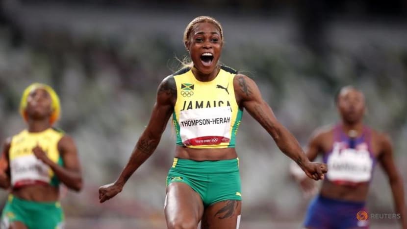 Athletics: Jamaica's Thompson-Herah wins women's 100m gold at Tokyo Olympics Athletics: Jamaica's Thompson-Herah wins women's 100m gold at Tokyo Olympics